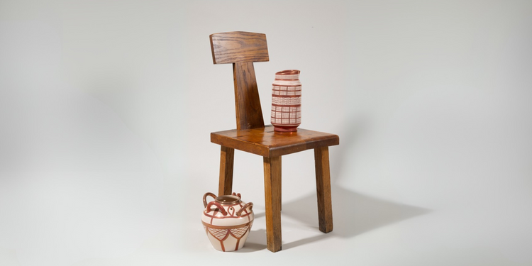 Tall handmade ceramic vases with tin glaze and lustreware finish – ideal for modern, sculptural floral arrangements.