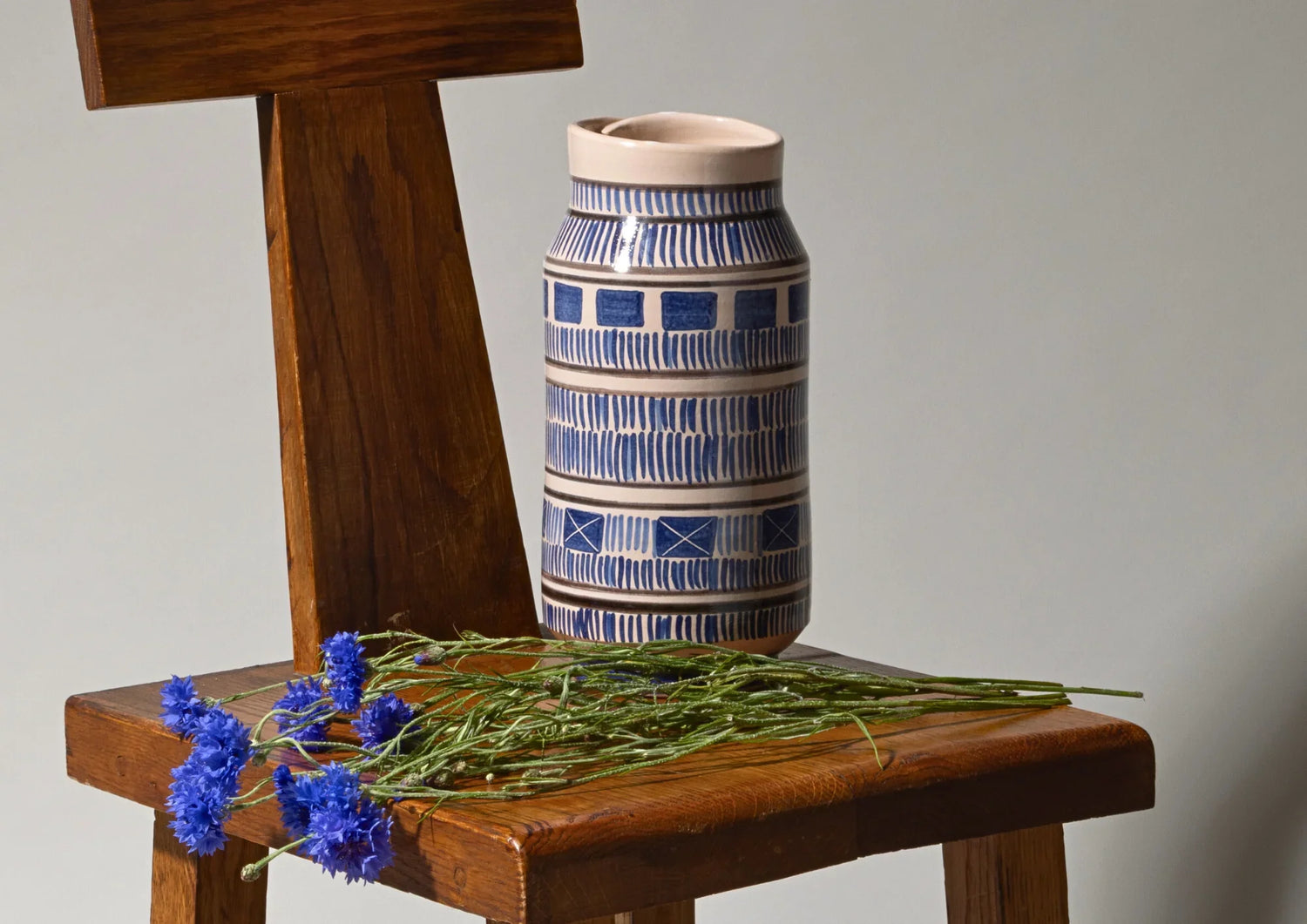 Handmade ceramic flower vases with tin glaze and lustreware, for single stems or wild floral arrangements.