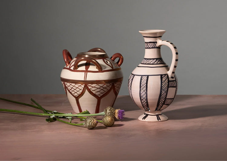 Small handmade ceramic bud vases with tin glaze and lustreware – ideal for single stems and modern interiors.