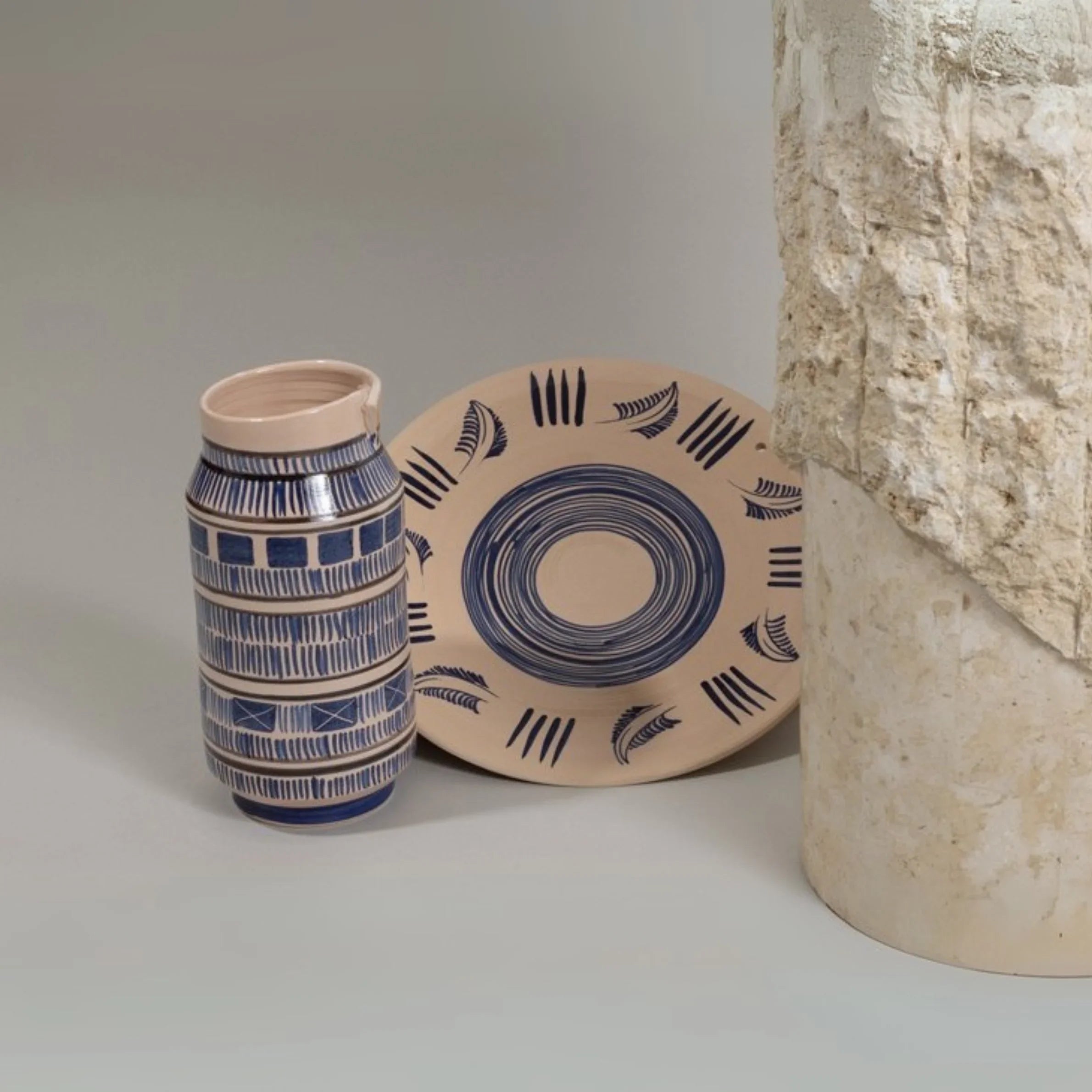 Decorative ceramic wall plates, handmade with tin glaze and lustreware for modern Mediterranean-inspired interiors.