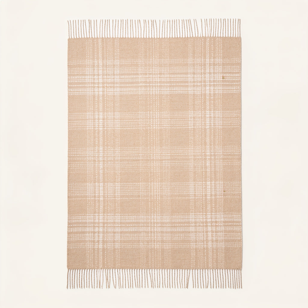 spread wide on the floor throw blanket alpaca in vanilla and beige colours. Purled long fringes