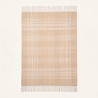 spread wide on the floor throw blanket alpaca in vanilla and beige colours. Purled long fringes
