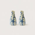 Two ceramic vases with blue abstract patterns on a white background