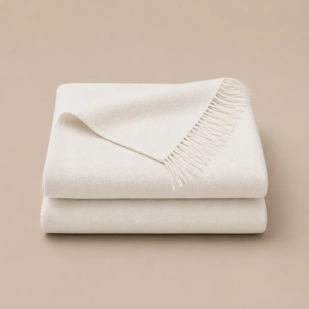 blanket throw off white cashmere wool folded