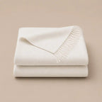 blanket throw off white cashmere wool folded