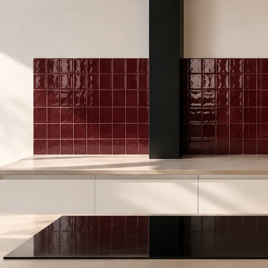 Burgundy red gloss ceramic tiles used on an interior wall