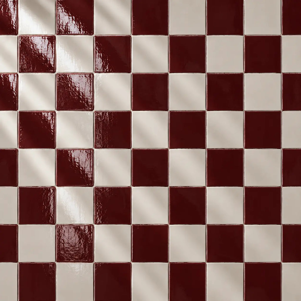 Burgundy red and white ceramic tiles in checkerboard pattern