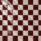 Burgundy red and white ceramic tiles in checkerboard pattern