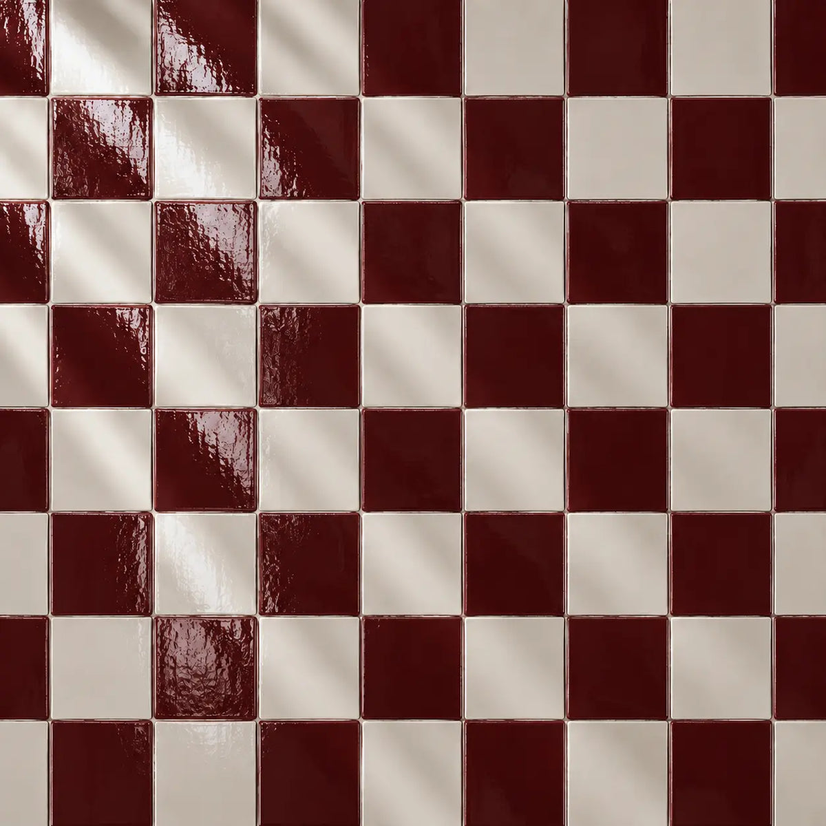 Burgundy red and white ceramic tiles in checkerboard pattern