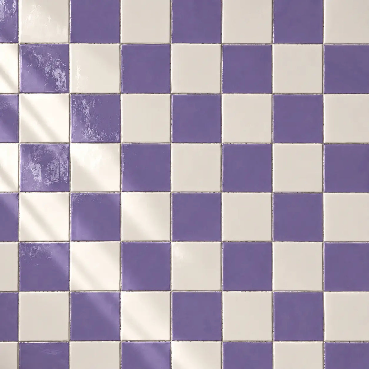 Lilac and white ceramic tiles in checkerboard pattern