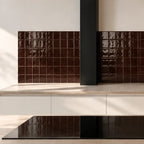 Cholate brown gloss ceramic tiles used on an interior wall