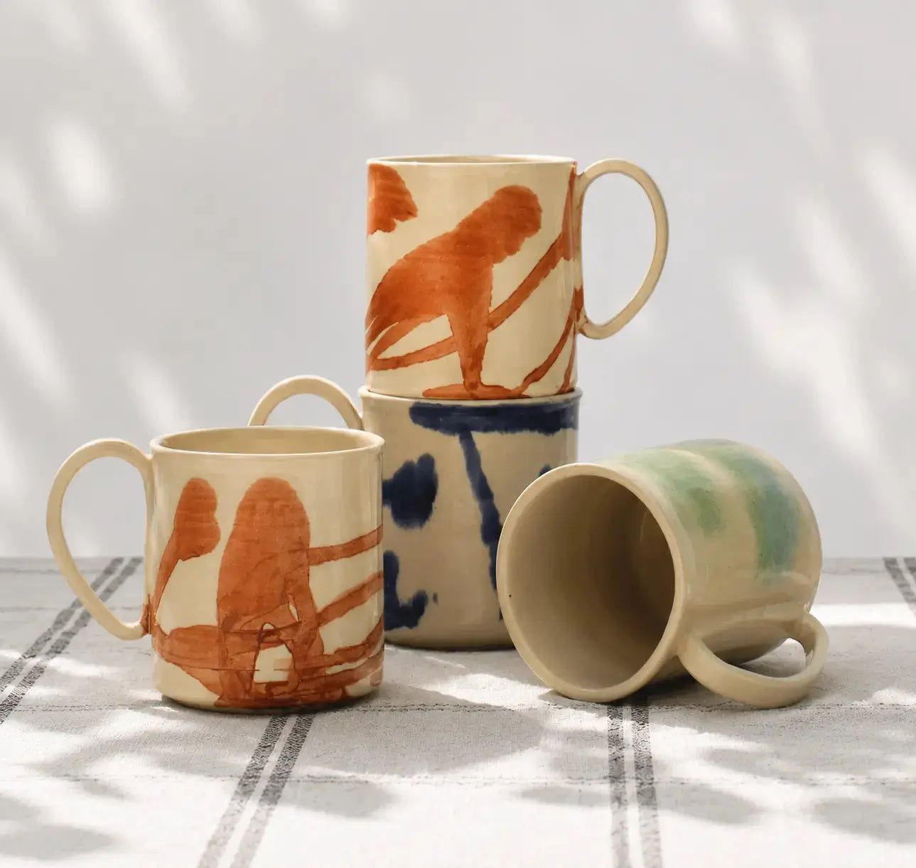 Copper Brush porcelain Mug composition in blue and green too