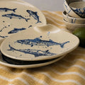Duo Tide handmade stoneware dinner plates with cobalt blue fish