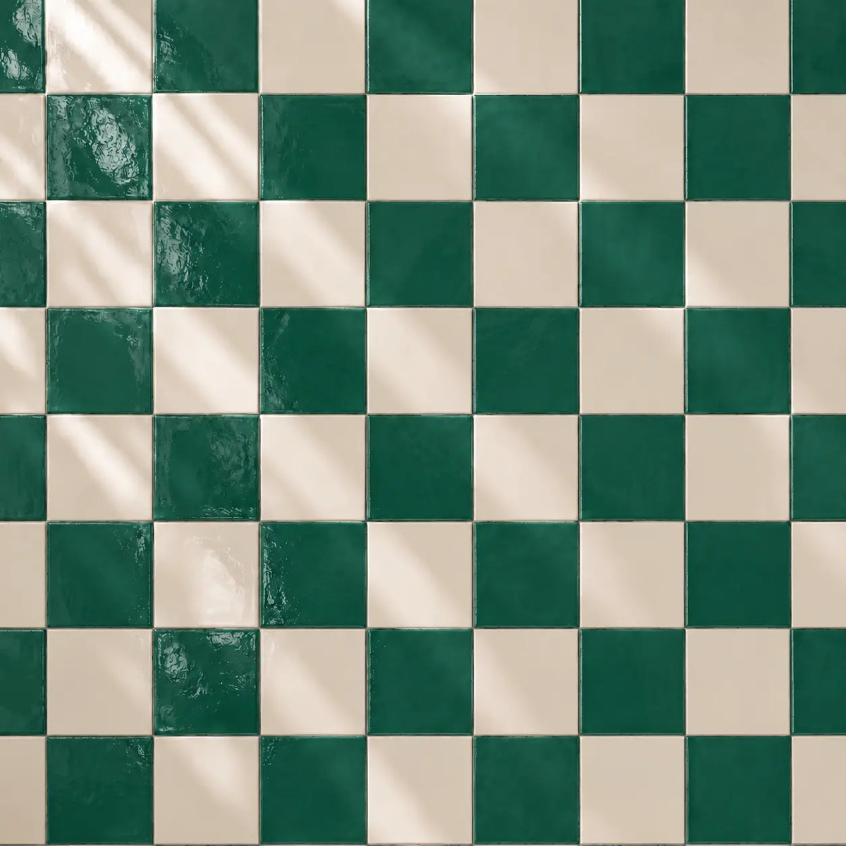 Checkered pattern of emerald dark green and white tiles