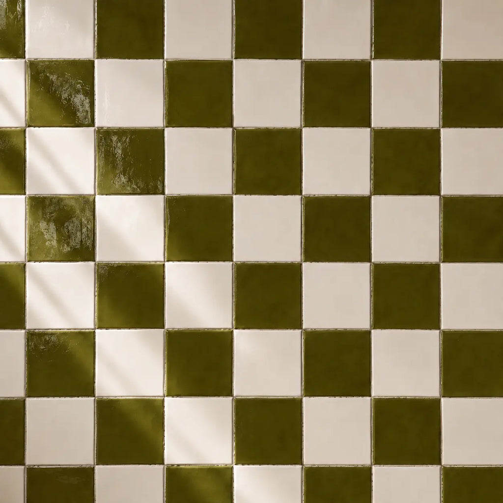 Moss green and white ceramic tiles in checkerboard pattern