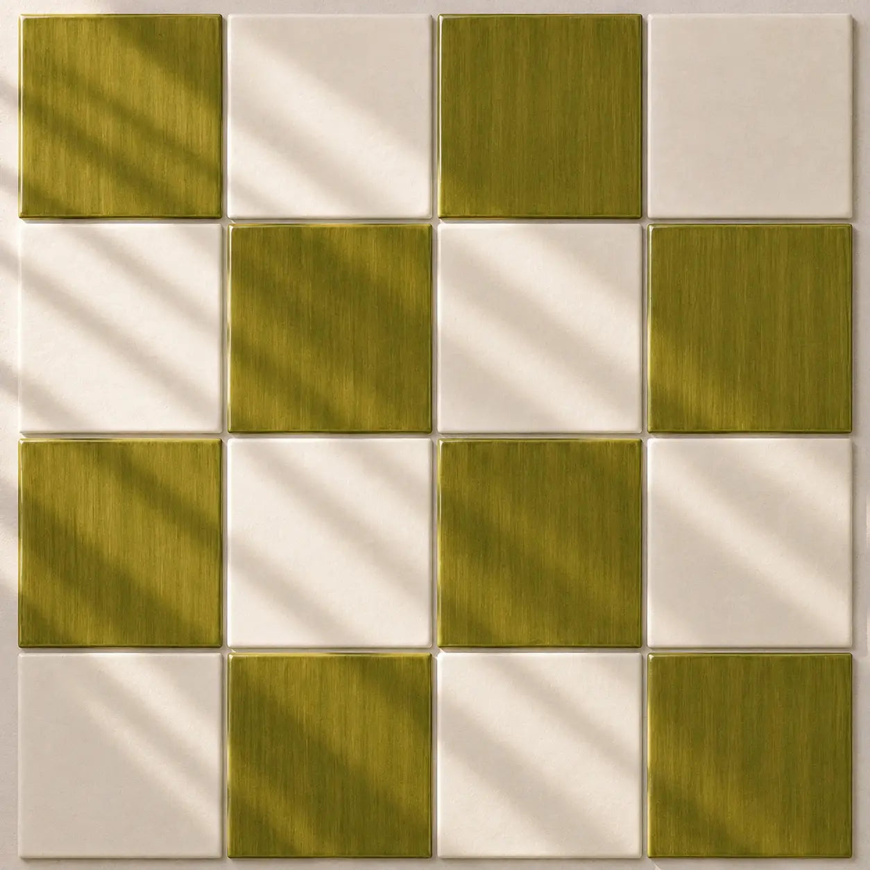 A 4x4 mosaic tile pattern featuring alternating brushed brass-gold and off-white square tiles, with soft diagonal shadows cast across the surface.