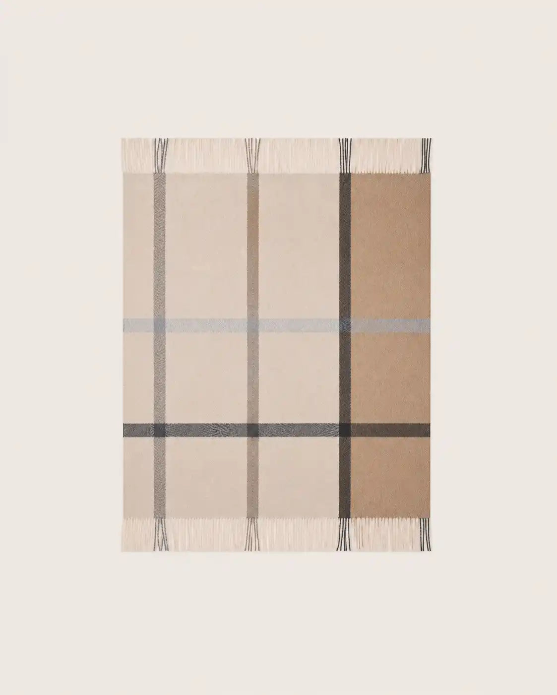 A rectangular woven throw blanket with a classic check pattern in beige, tan, brown, and gray, featuring fringed edges on all sides, shown flat against a light off-white background.