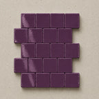 Handmade plum ceramic tiles showing natural variation