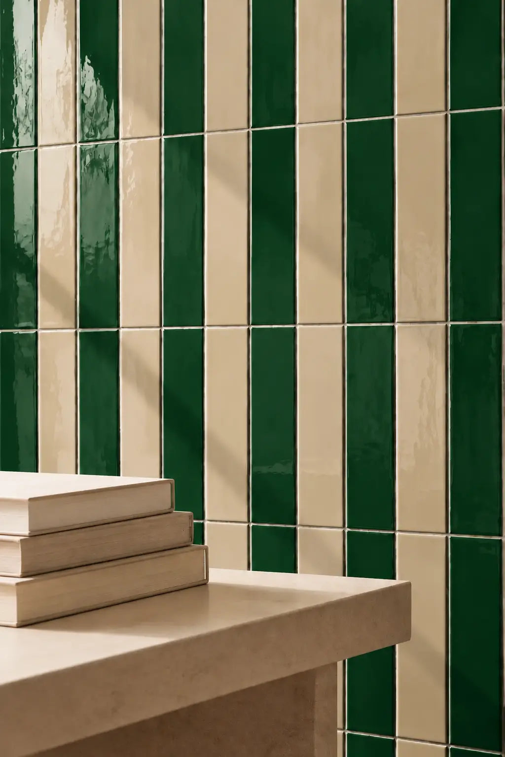 forest green rectangular gloss tile wall with table nearby