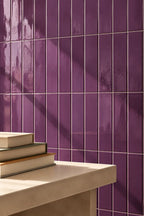 violet rectangular gloss tile wall with table nearby