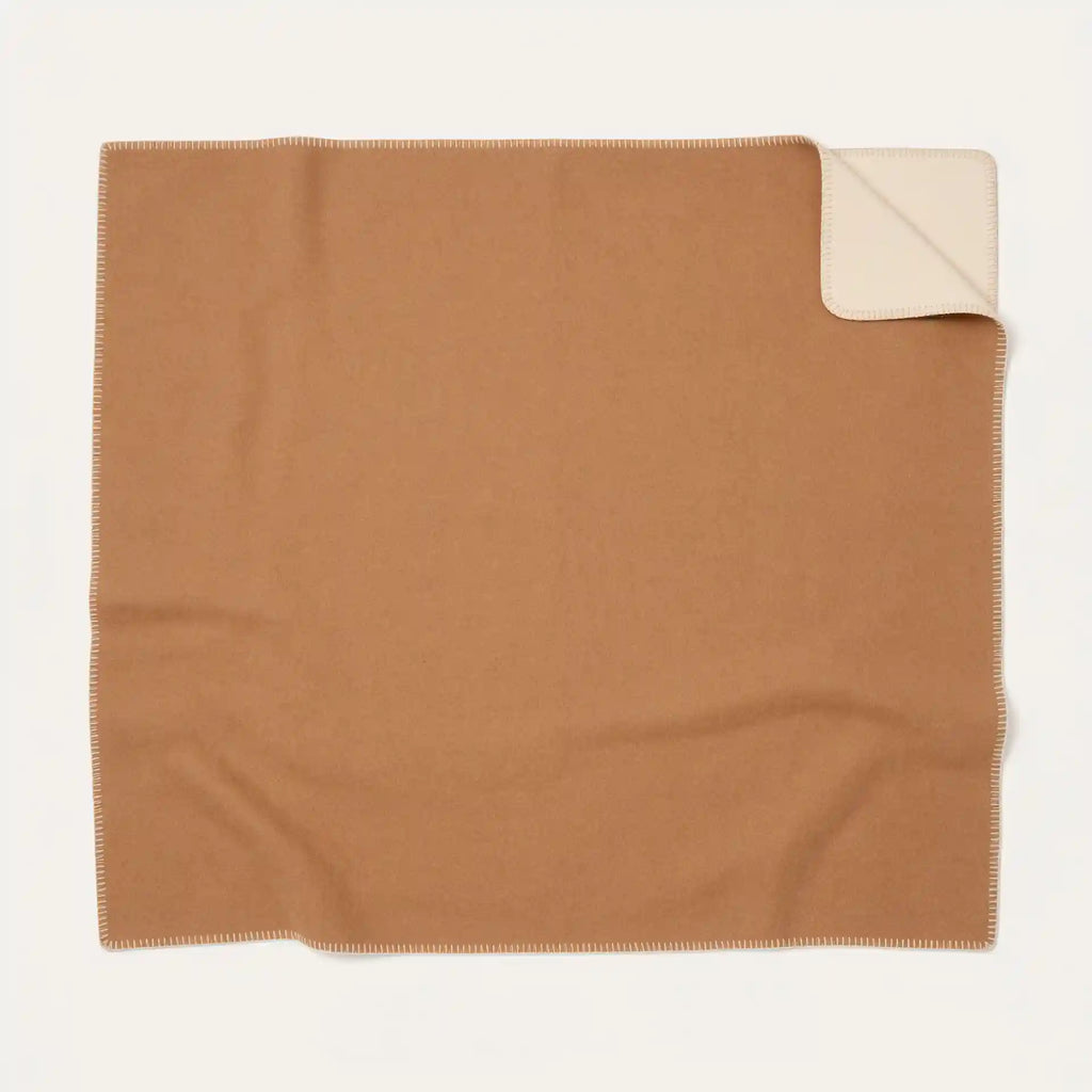 extended reversible throw blanket in camel and ivory close up 100% alpaca