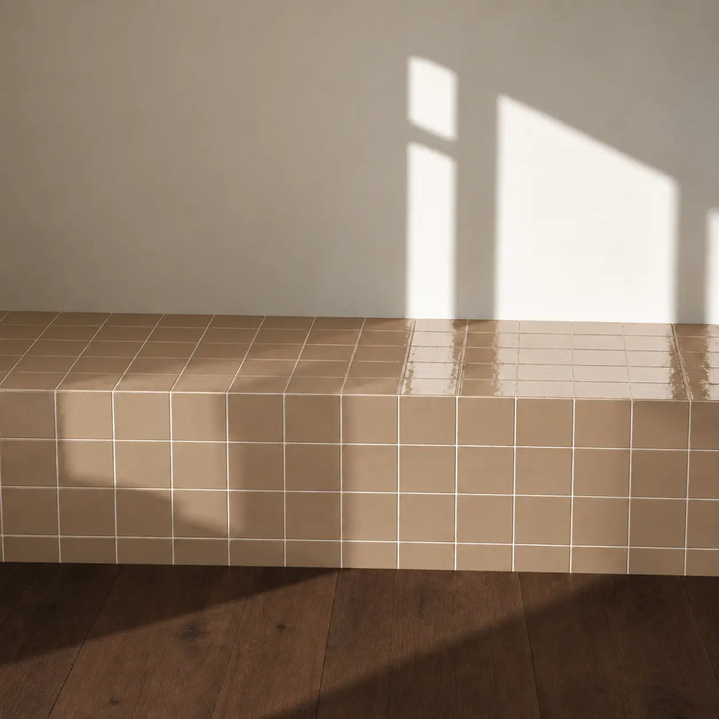 Sand colour ceramic tiles used on an interior wall