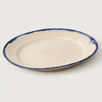 Underside of handmade Shoreline stoneware dinner plate