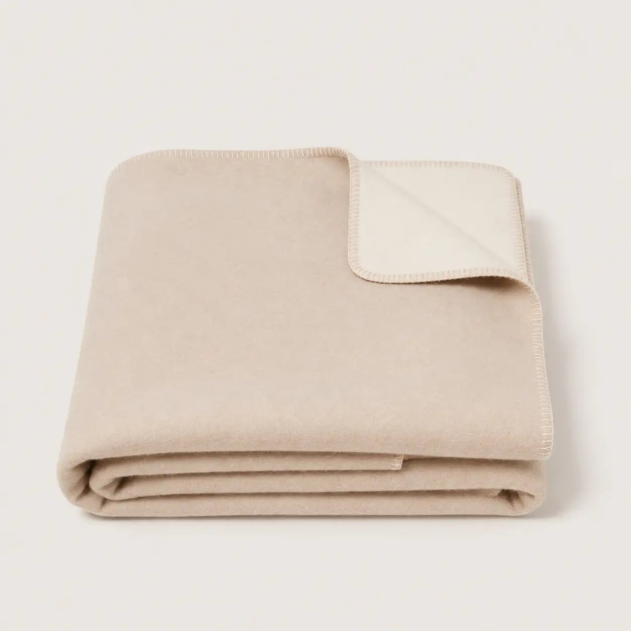 signature throw blanket in sand and porcelain folded alpaca 100%