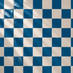 Checkered pattern of teal blue and beige tiles
