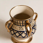 close up threefold vase in lustreware