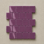 Handmade violet ceramic tiles showing natural variation
